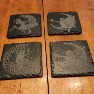 Set of four engraved slate coasters with fairy and moon fantasy designs