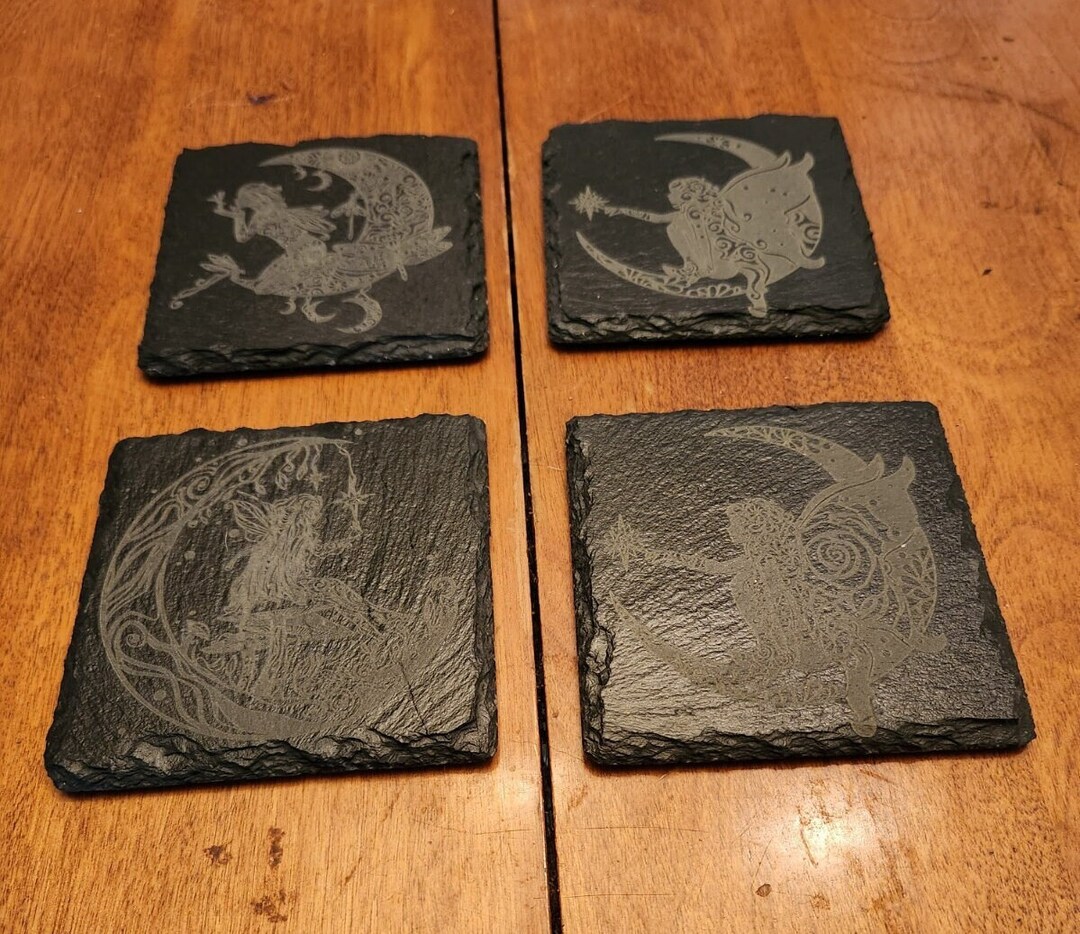 Set of four engraved slate coasters with fairy and moon fantasy designs