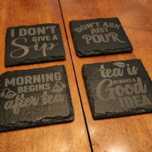 Set of four engraved slate coasters with funny tea quotes