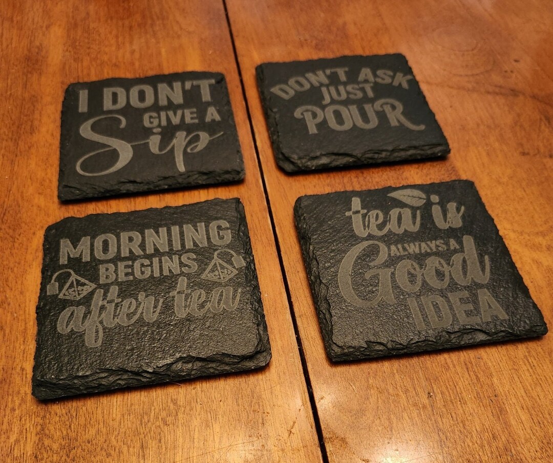 Set of four engraved slate coasters with funny tea quotes